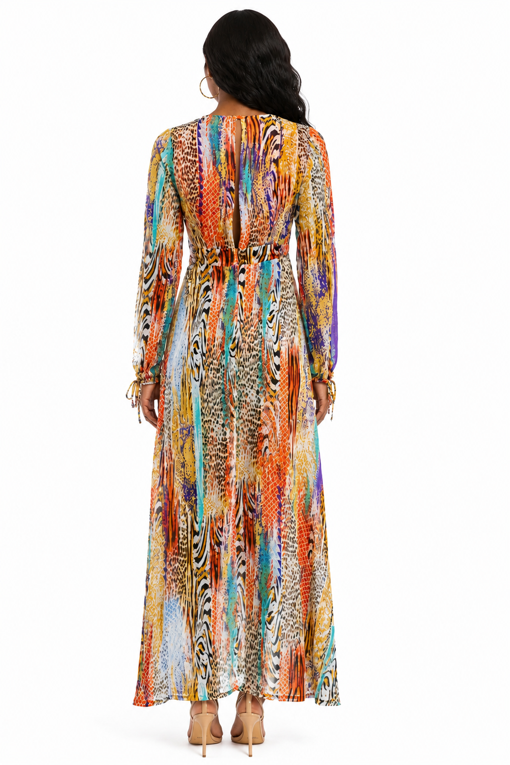 Woman wearing a colorful patterned dress on a white background